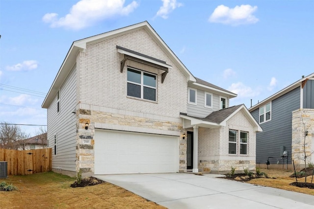 view of front of property featuring a garage and central AC