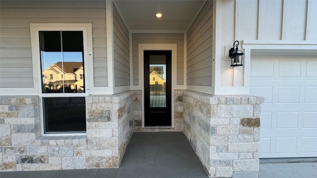 property entrance featuring a garage