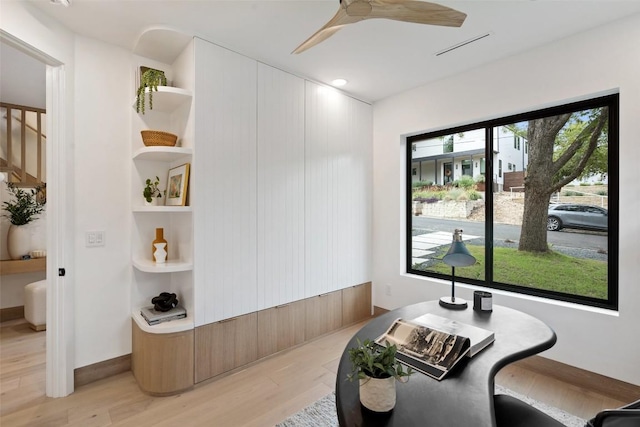 interior space featuring ceiling fan and light hardwood / wood-style floors