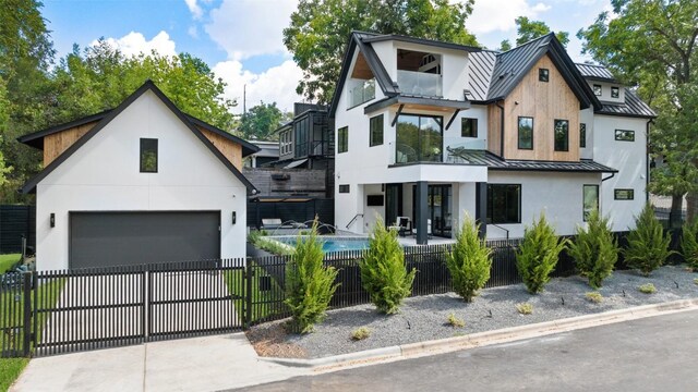 modern farmhouse style home featuring a garage