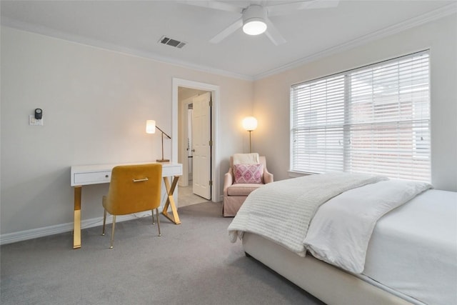 bedroom with carpet floors, ceiling fan, and ornamental molding