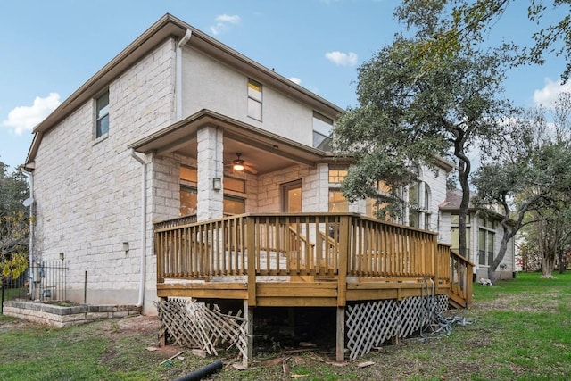 rear view of property with a wooden deck