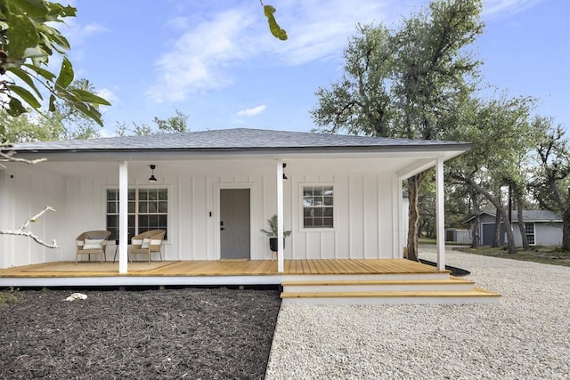 back of house with covered porch