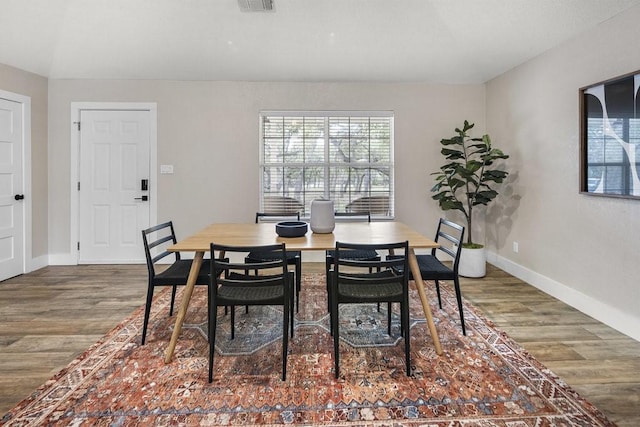 dining room featuring wood-type flooring