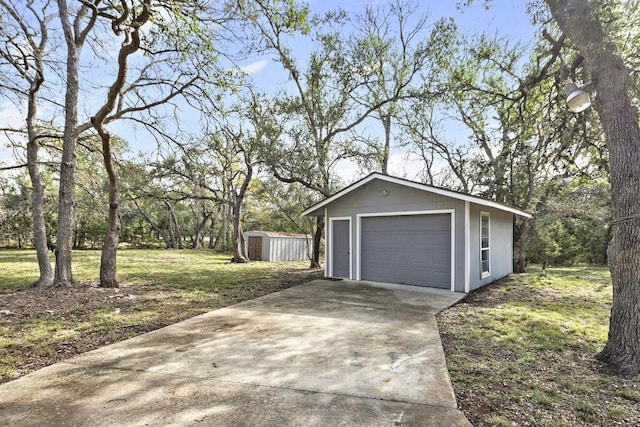 garage with a lawn