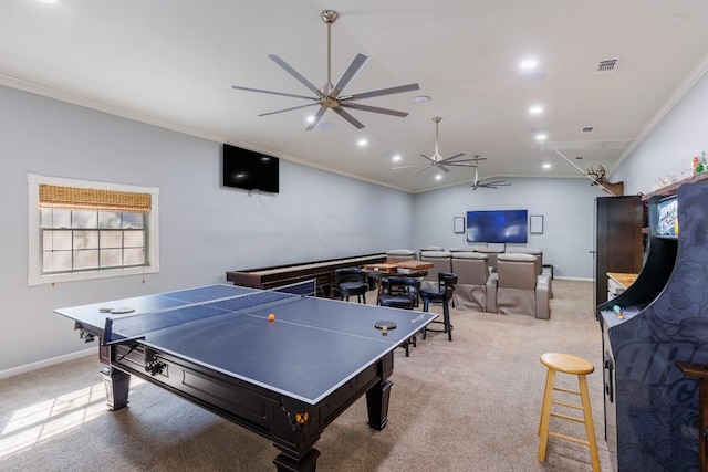 game room with light carpet, ceiling fan, and ornamental molding