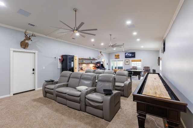 carpeted home theater room with lofted ceiling, ceiling fan, ornamental molding, and pool table