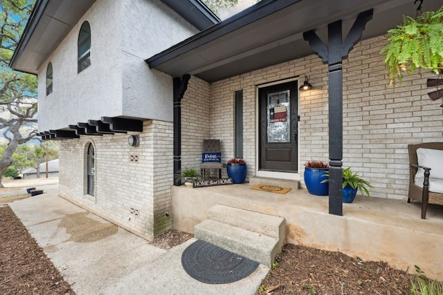 entrance to property with a porch