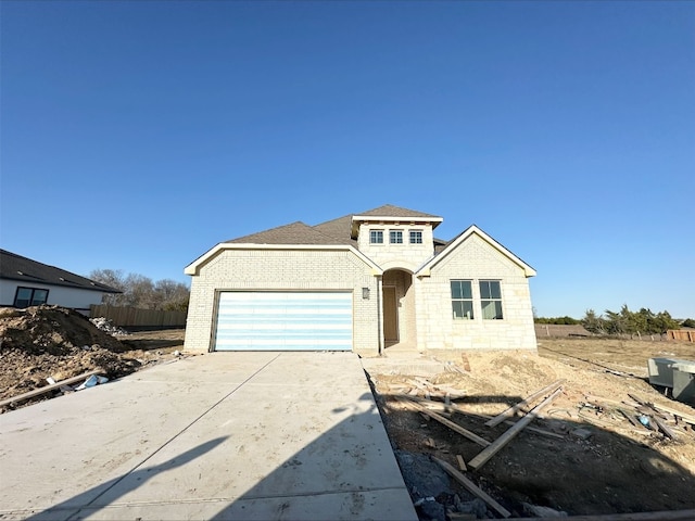 view of front of home with a garage