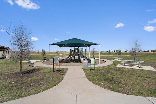 view of play area featuring a lawn