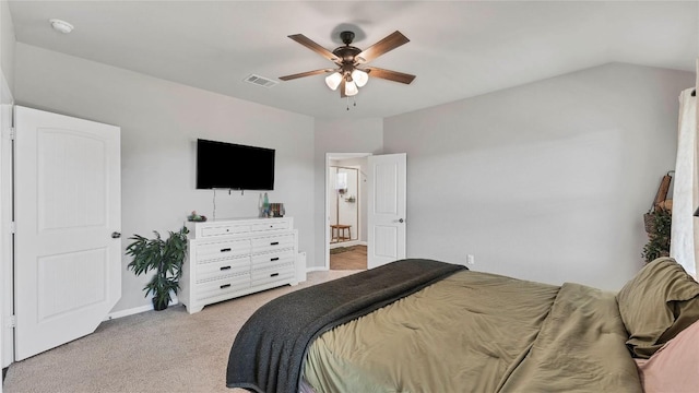 bedroom with light colored carpet and ceiling fan