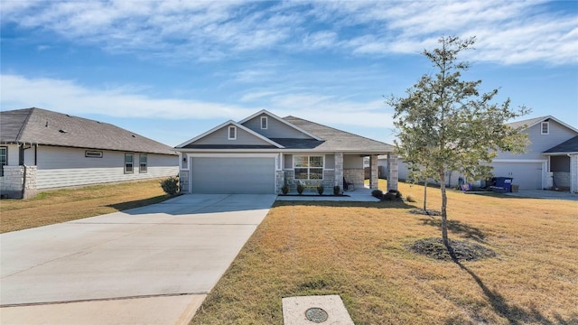 view of front facade featuring a garage and a front lawn