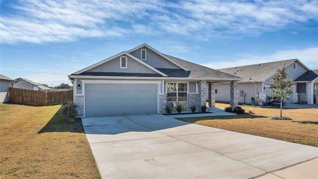 view of front of house with a garage and a front yard