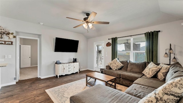 living room featuring ceiling fan, lofted ceiling, and dark hardwood / wood-style flooring