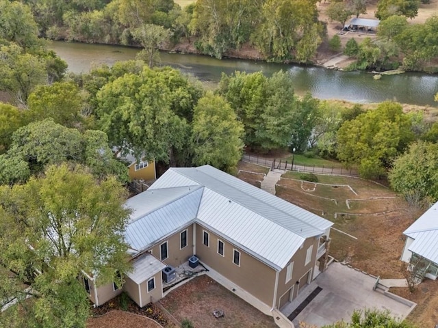 bird's eye view with a water view