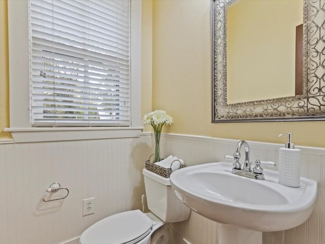 bathroom with toilet and sink