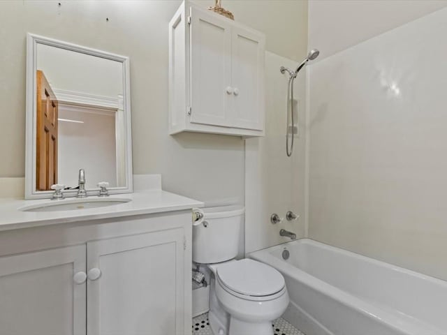 full bathroom with shower / tub combination, tile patterned flooring, vanity, and toilet