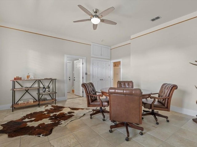 dining area with ceiling fan