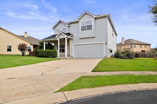 view of front facade featuring a garage and a front lawn