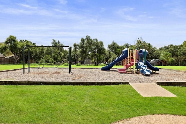 view of jungle gym with a yard