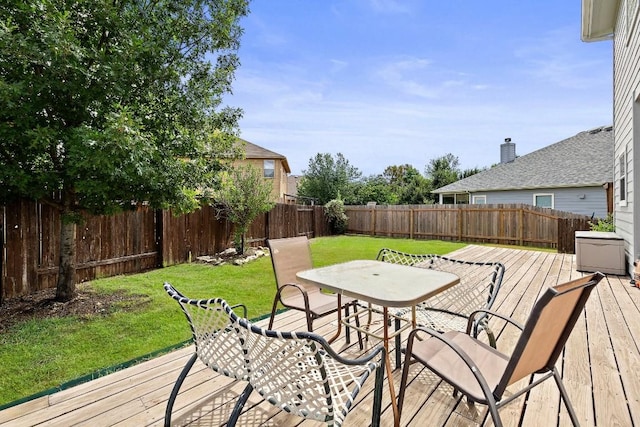 wooden deck with a yard