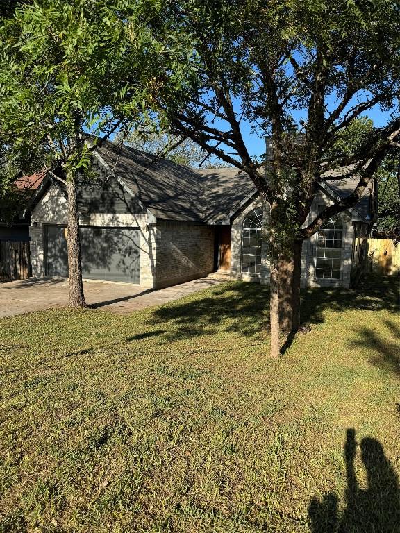 view of yard with a garage