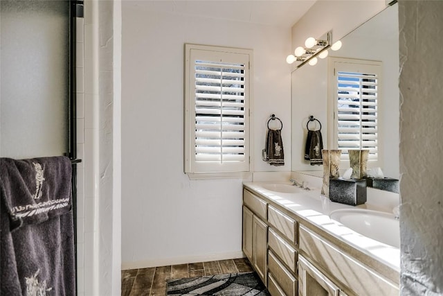 bathroom featuring vanity and wood-type flooring