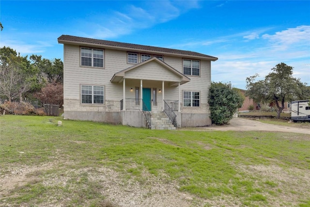 view of front of property with a front lawn