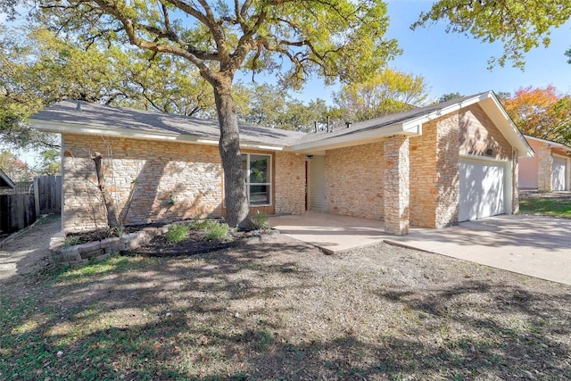 single story home with a garage