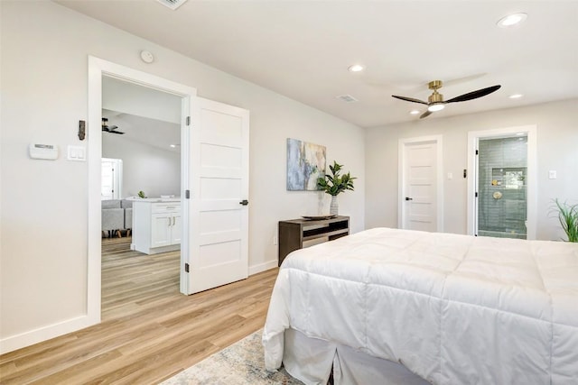 bedroom featuring light hardwood / wood-style flooring and ceiling fan