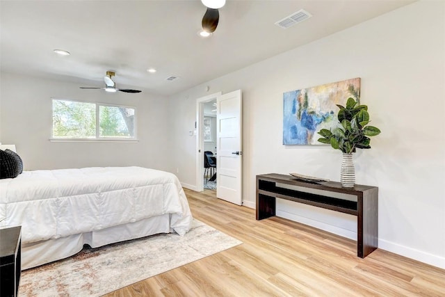 bedroom featuring ceiling fan and light wood-type flooring