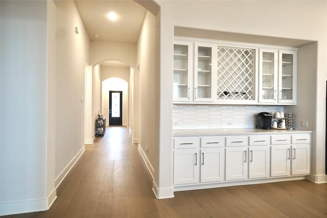 hall with light hardwood / wood-style floors