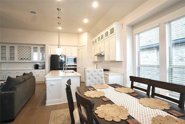 dining area featuring dark hardwood / wood-style flooring