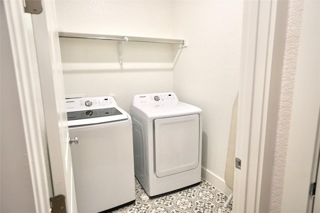 washroom featuring independent washer and dryer