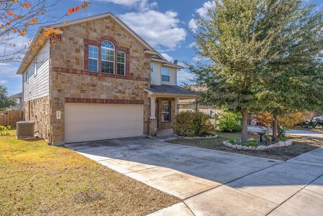 view of front of home with a front lawn, a garage, and cooling unit