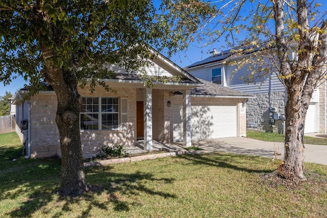 view of front of property featuring a garage, covered porch, and a front lawn