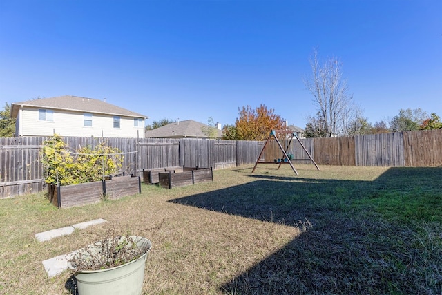 view of yard with a playground