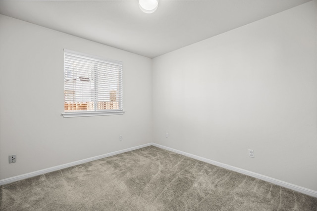 empty room featuring carpet flooring