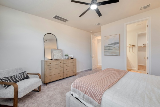 bedroom featuring light carpet and ceiling fan