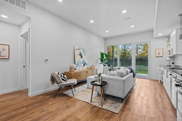 living room with light wood-type flooring