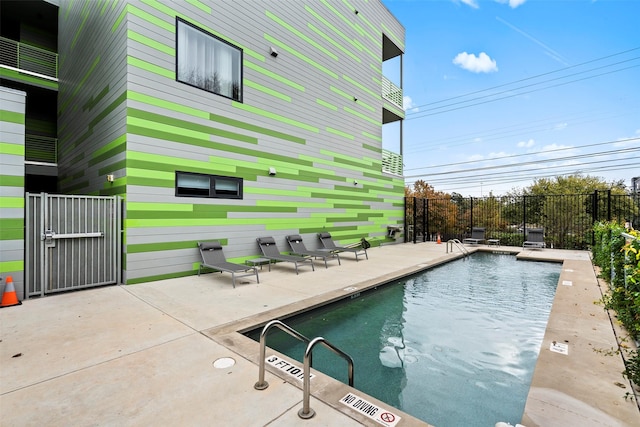 view of pool with a patio