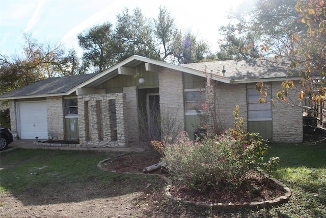 ranch-style home with a garage