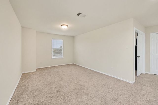 360 Gina Dr, Kyle, TX 78640 - empty room with light colored carpet and baseboards