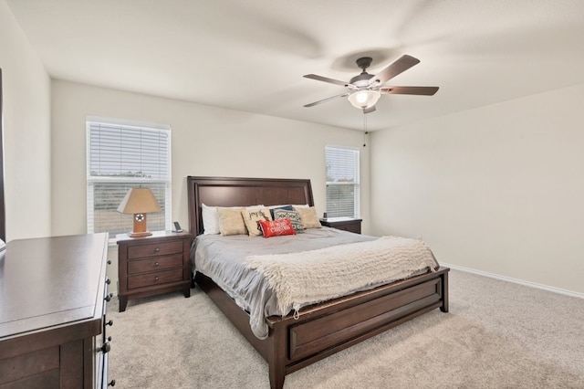360 Gina Dr, Kyle, TX 78640 - bedroom with light colored carpet, baseboards, and ceiling fan