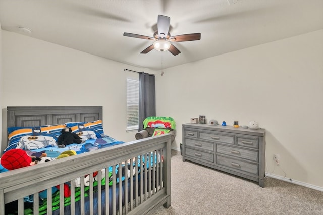 carpeted bedroom featuring ceiling fan