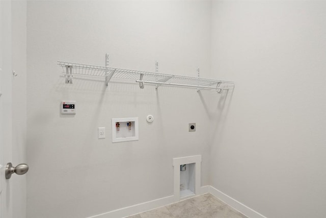 laundry area featuring hookup for an electric dryer, hookup for a gas dryer, and washer hookup