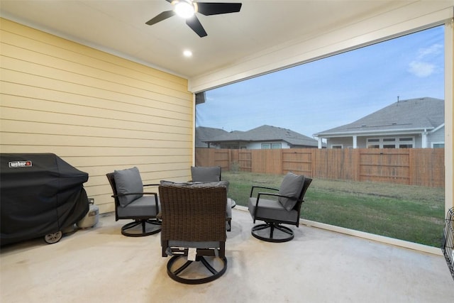 view of patio featuring ceiling fan and grilling area