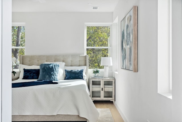 bedroom with light hardwood / wood-style flooring