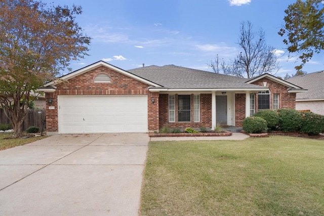 ranch-style house featuring a garage and a front lawn