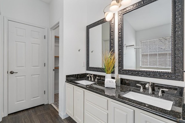 bathroom featuring vanity and hardwood / wood-style flooring